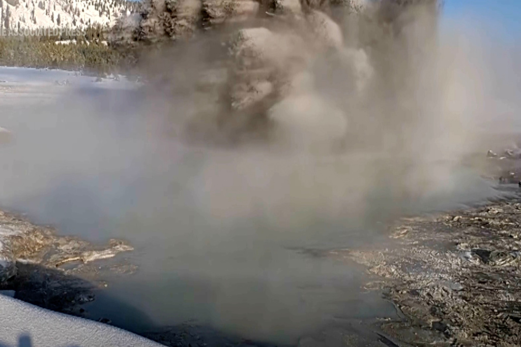 This image made from video provided by the United States Geological Survey (USGS) shows a muddy eruption at Black Diamond Pool in Yellowstone National Park on Saturday, Dec. 20, 2025. (U.S. Geological Survey via AP)