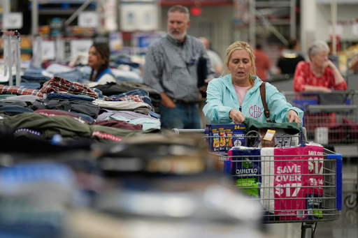 People shop for clothing at a Sam's Club, Wednesday, Sept. 24, 2025, in Bentonville, Ark. (AP Photo/Charlie Riedel) People shop for clothing at a Sam's Club, Wednesday, Sept. 24, 2025, in Bentonville, Ark. (AP Photo/Charlie Riedel)