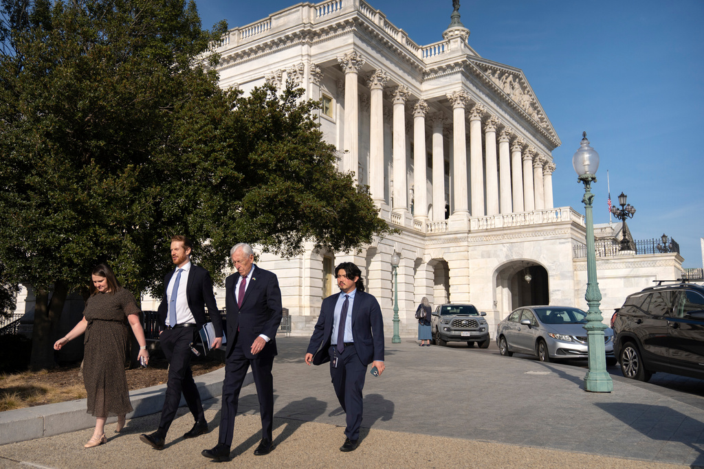 Rep. Steny Hoyer, D-Md., second from right, leaves after speaking on the House floor at the Capitol, Thursday, Jan. 8, 2026, in Washington. (AP Photo/Mark Schiefelbein)