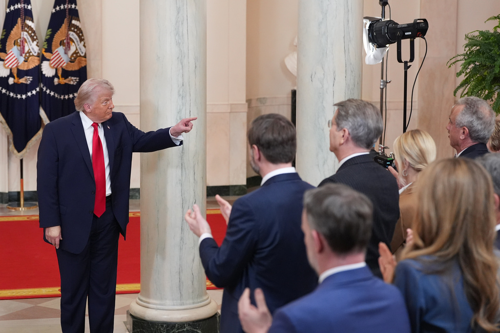 President Donald Trump gestures after speaking about the Iran war from the Cross Hall of the White House on Wednesday, April 1, 2026, in Washington. (AP Photo/Alex Brandon, Pool)