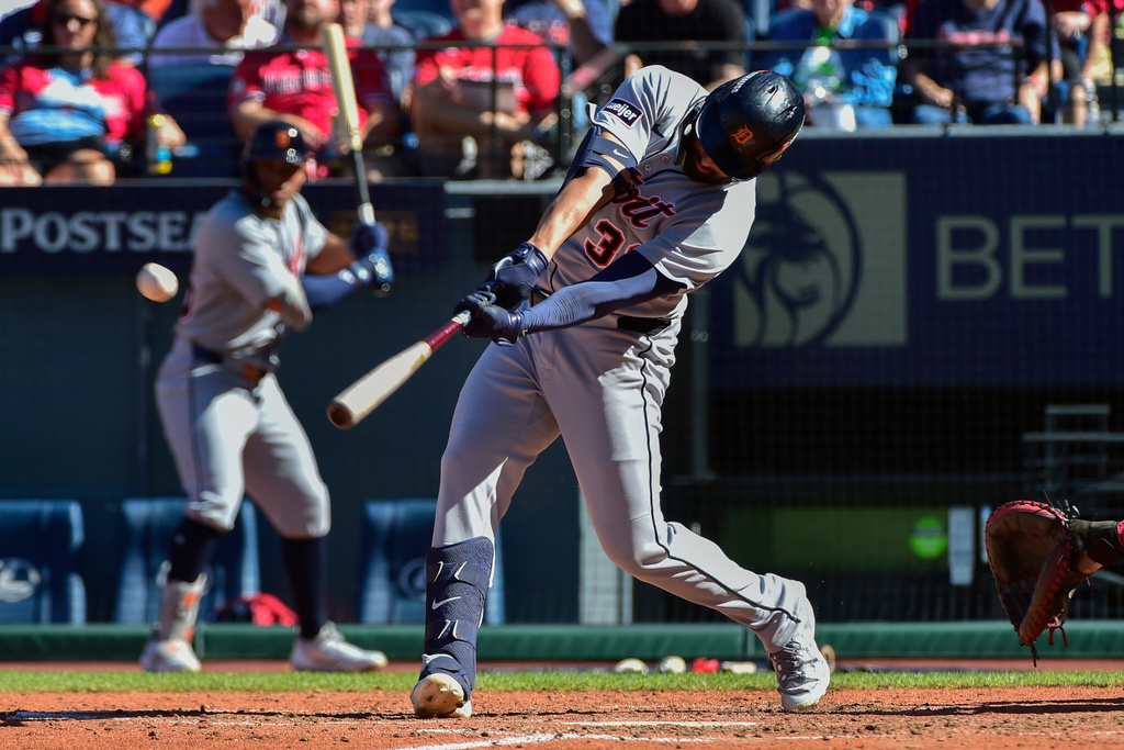 Detroit Tigers' Riley Greene hits a double in the seventh inning of Game 1 of the American League Wild Card baseball playoff series against the Cleveland Guardians in Cleveland, Tuesday, Sept. 30, 2025. (AP Photo/Phil Long)
