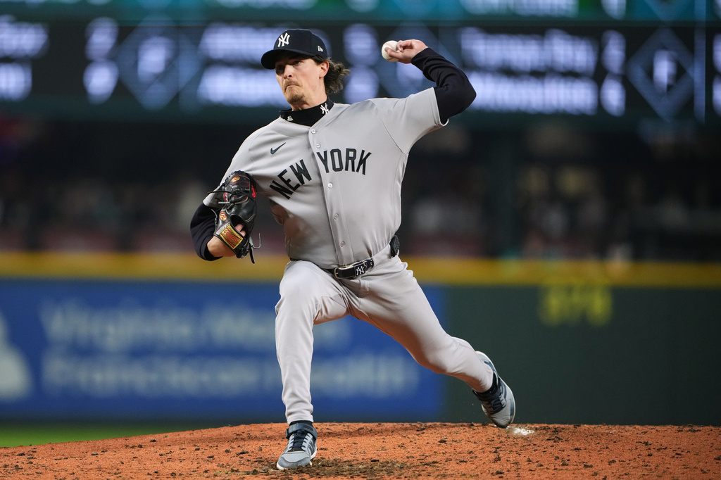 New York Yankees starting pitcher Max Fried throws against the Seattle Mariners during the fourth inning of a baseball game, Tuesday, March 31, 2026, in Seattle. (AP Photo/Lindsey Wasson)