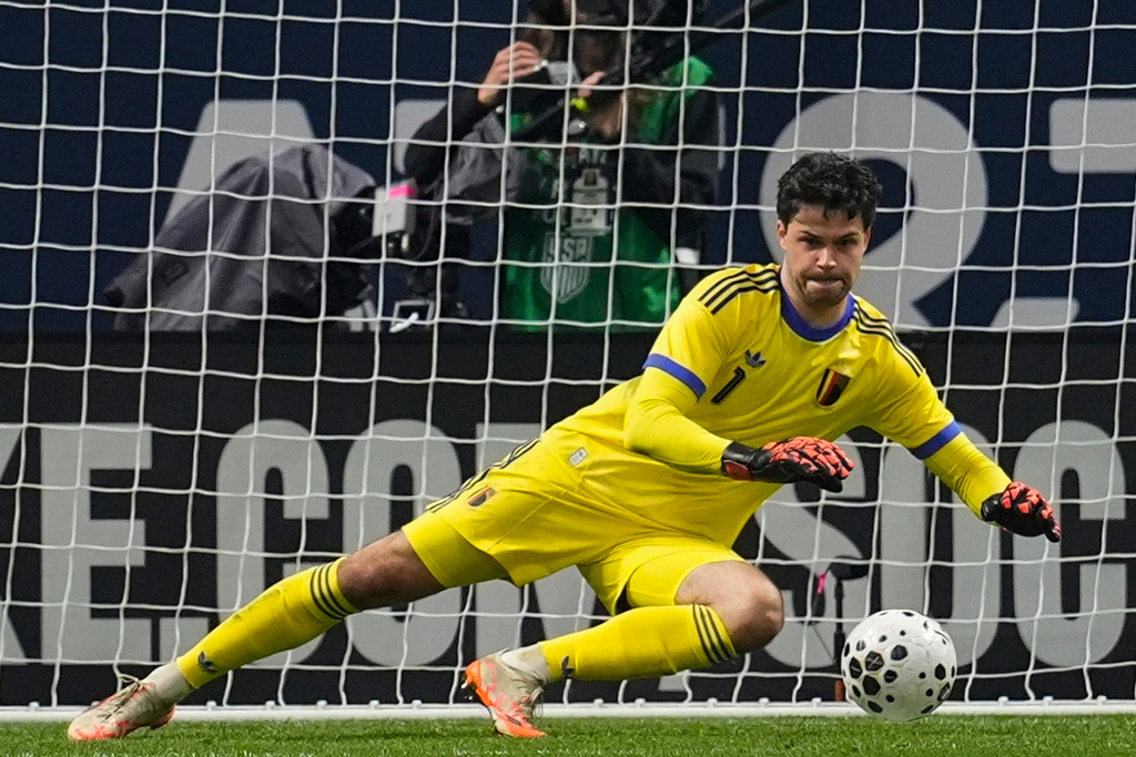 Belgium goalkeeper Senne Lammens makes a save against the United States during an international friendly soccer match, Saturday, March 28, 2026, in Atlanta. (AP Photo/Mike Stewart)