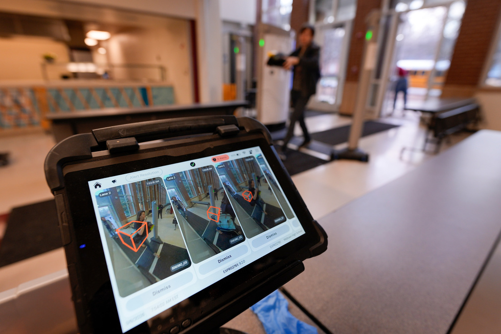 An alert resolution tablet is seen in the security area at Midtown High School, Friday, March 6, 2026, in Atlanta. (AP Photo/Mike Stewart)