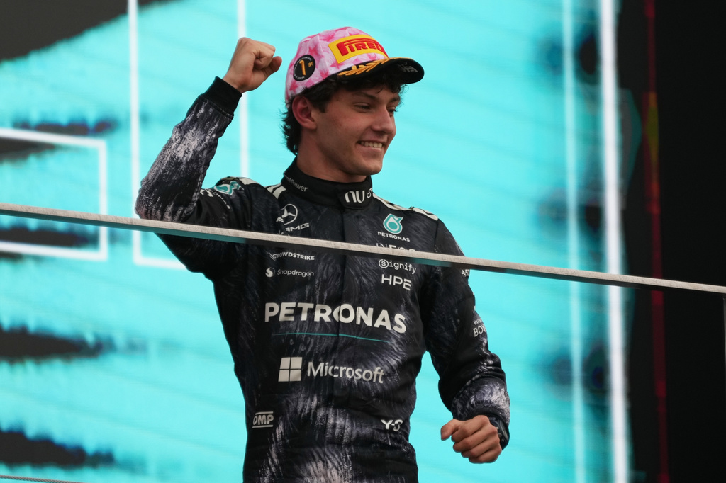 Mercedes driver Kimi Antonelli of Italy celebrates on the podium after winning the Japanese Formula One Grand Prix race in Suzuka, central Japan, Sunday, March 29, 2026. (AP Photo/Hiro Komae)
