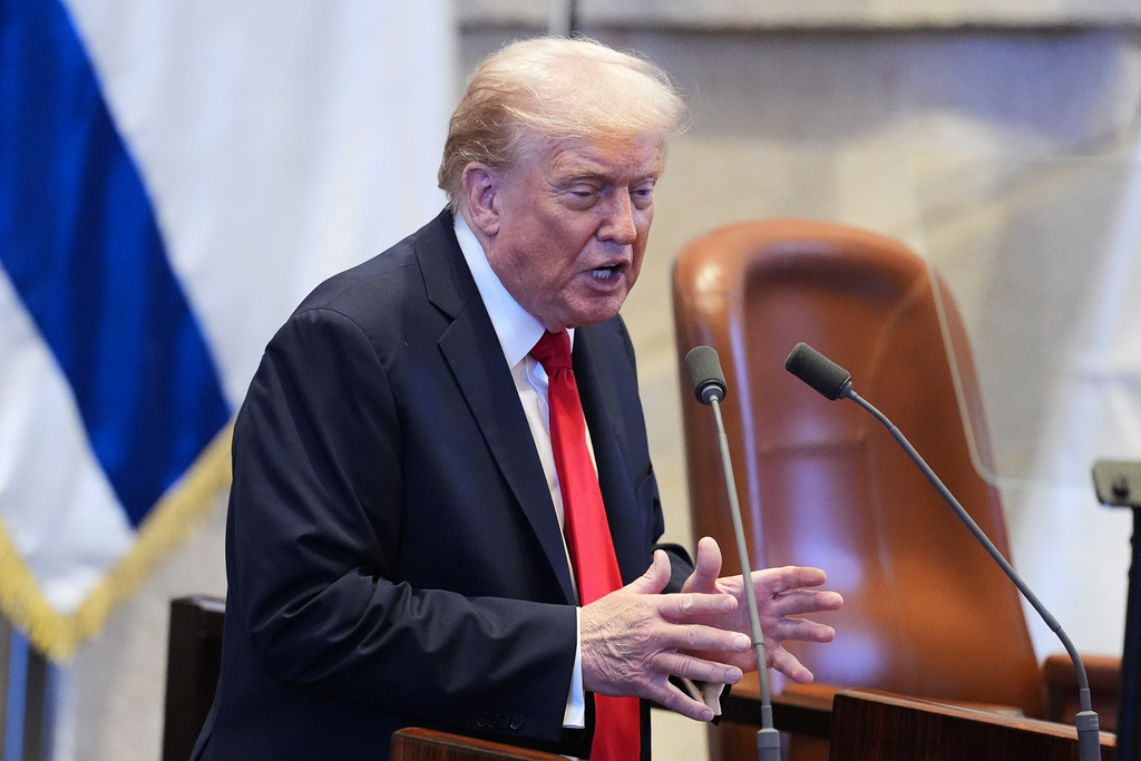 President Donald Trump speaks to the Knesset, Israel's parliament, Monday, Oct. 13, 2025, in Jerusalem. (AP Photo/Evan Vucci, Pool)
