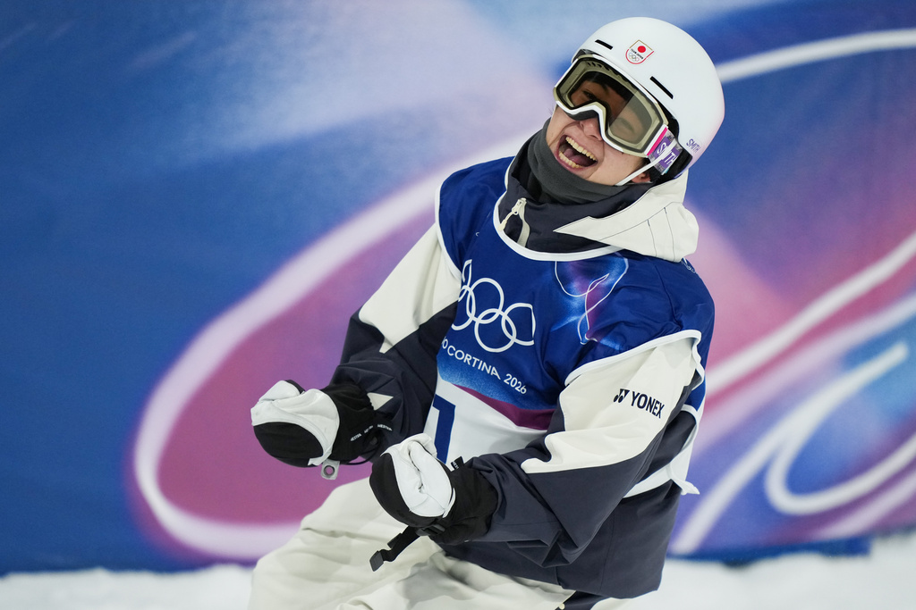 Japan's Yuto Totsuka celebrates during the men's snowboarding halfpipe finals at the 2026 Winter Olympics, in Livigno, Italy, Friday, Feb. 13, 2026. (AP Photo/Julia Demaree Nikhinson)