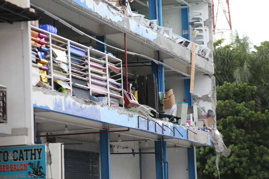 A building is damaged after an earthquake in General Santos, Philippines, Monday, June 8, 2026. (AP Photo)
