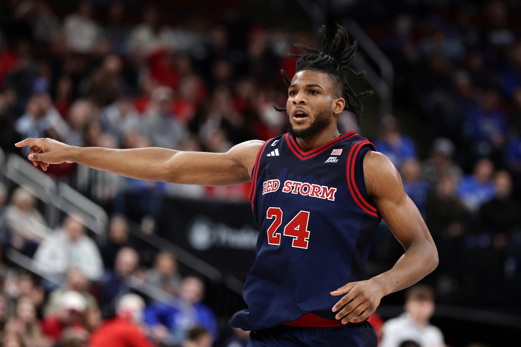 St. John's forward Zuby Ejiofor reacts during the first half of an NCAA college basketball game against Seton Hall, Friday, March 6, 2026, in Newark, N.J. (AP Photo/Adam Hunger)