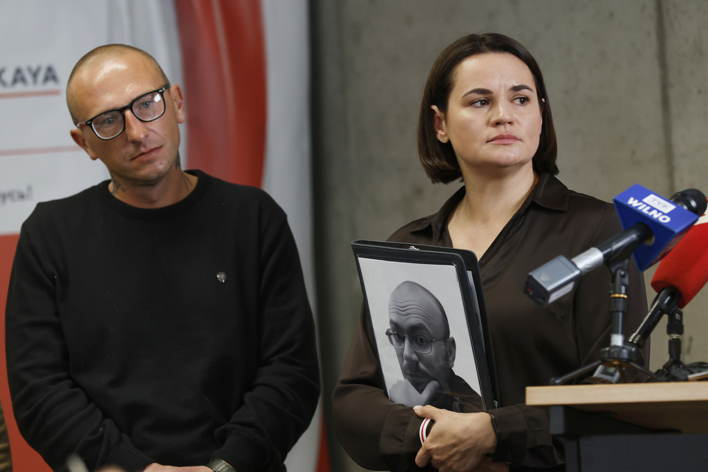Belarusian opposition leader Sviatlana Tsikhanouskaya, right, and Aliaksandr Mantsevich, one of a group of prisoners who were released by Belarusian authorities attend a news conference, in Vilnius, Lithuania, on Friday, Sept. 12, 2025. (AP Photo/Mindaugas Kulbis)