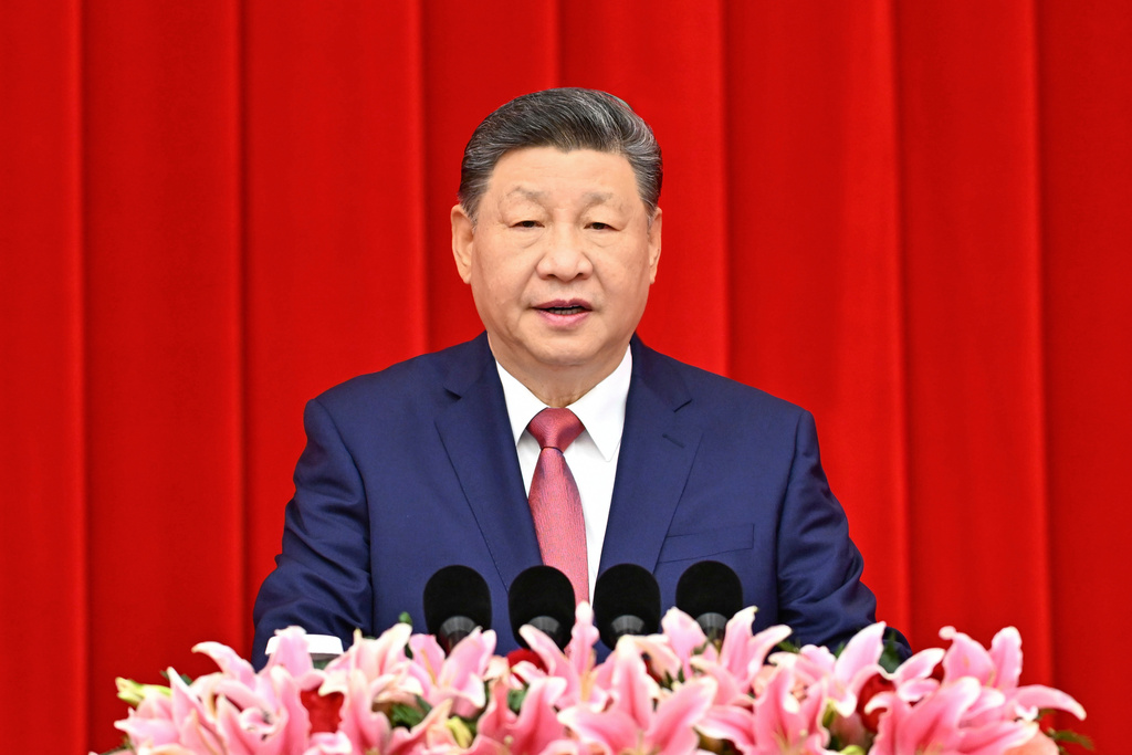 In this photo released by Xinhua News Agency, Chinese President Xi Jinping, also general secretary of the Communist Party of China Central Committee and chairman of the Central Military Commission, speaks at the New Year gathering held by the National Committee of the Chinese People's Political Consultative Conference (CPPCC) in Beijing on Wednesday, Dec. 31, 2025. (Yan Yan/Xinhua via AP)