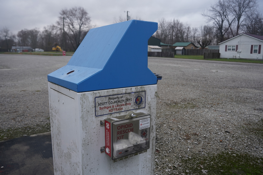 A sharps disposal bin to safely discard used syringes and lancets is installed in Austin, Ind., by the Scott County Health Department Tuesday, Nov. 23, 2025. (AP Photo/Obed Lamy)