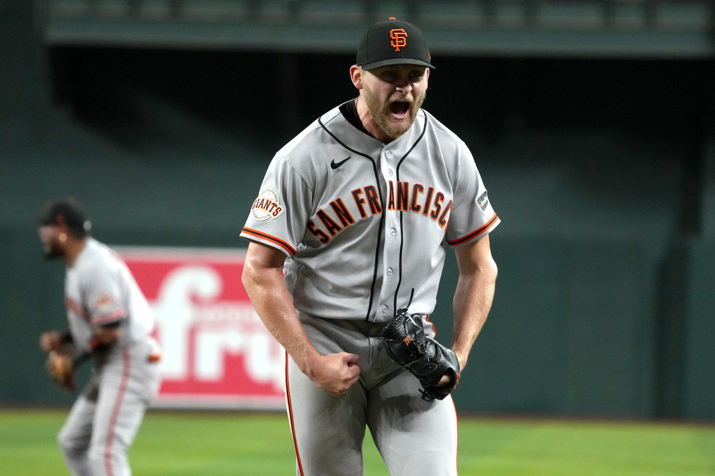 San Francisco Giants pitcher Keaton Winn reacts after getting the last out against the Arizona Diamondbacks in the seventh inning of a baseball game Tuesday, May 19, 2026, in Phoenix. (AP Photo/Rick Scuteri)