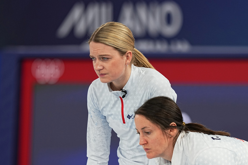 United States' Cory Thiesse, left, and Tabitha Peterson compete during a women's curling bronze medal match between Canada and the United States, at the 2026 Winter Olympics, in Cortina d'Ampezzo, Italy, Saturday, Feb. 21, 2026. (AP Photo/Fatima Shbair)