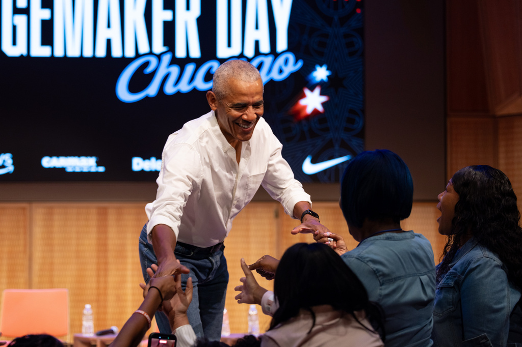 Former President Barack Obama surprises a group of high school freshman girls during the WNBA Changemaker Day at the Obama Presidential Center in Jackson Park on the South Side, Friday, July 24, 2026. (Candace Dane Chambers/Chicago Sun-Times via AP)