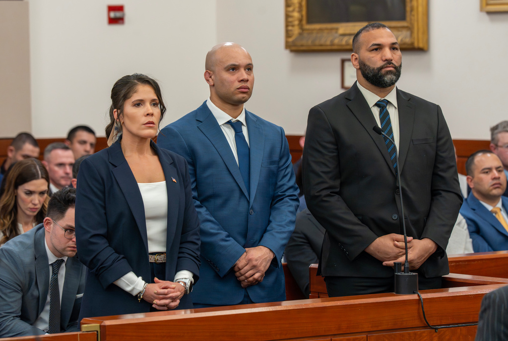 Lt. Jennifer Penton and from left, troopers David Montanez and Edwin Rodriguez are arraigned in Worcester Superior Court on Thursday, April 2, 2026 in Worcester, Mass. (Rick Cinclair/Worcester Telegram & Gazette via AP, Pool)