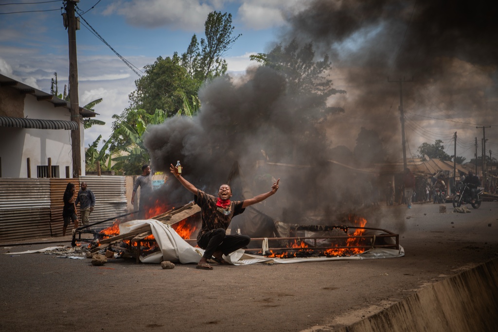 People protest in the streets of Arusha, Tanzania, on election day Wednesday, Oct. 29, 2025. (AP Photo/str)