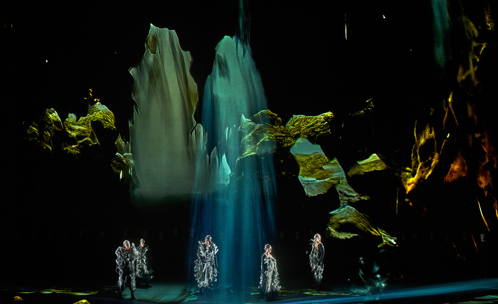 This image released by the Bayreuth Festival shows a dress rehearsal of Wagner's "Götterdämmerung” from the AI-driven 150th anniversary production of the Ring Cycle at the Festspielhaus in Bayreuth, Germany on July 26, 2026. (Enrico Nawrath/Bayreuth Festival via AP)