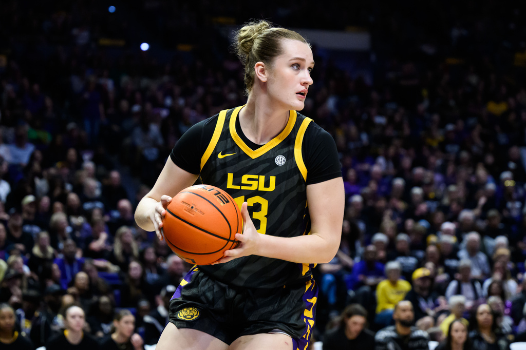 FILE - LSU forward Kate Koval (13) looks to pass during the first half of an NCAA women's college basketball game against South Carolina in Baton Rouge, Saturday, Feb. 14, 2026. (AP Photo/Ella Hall, FIle)