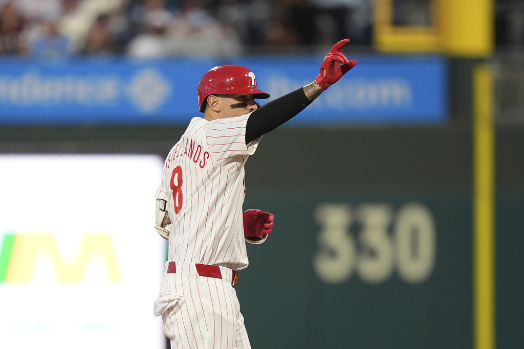Philadelphia Phillies' Nick Castellanos reacts after hitting a run-scoring single against New York Mets pitcher Nolan McLean during the second inning of a baseball game Monday, Sept. 8, 2025, in Philadelphia. (AP Photo/Matt Slocum)