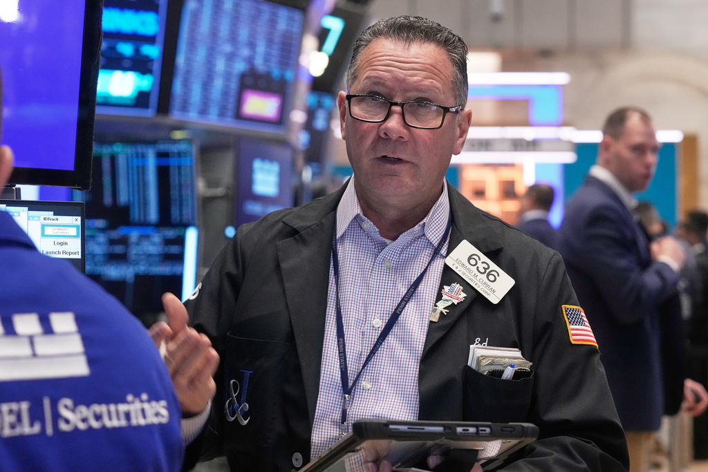 Trader Edward Curran works on the floor of the New York Stock Exchange, Monday, Nov. 24, 2025. (AP Photo/Richard Drew)