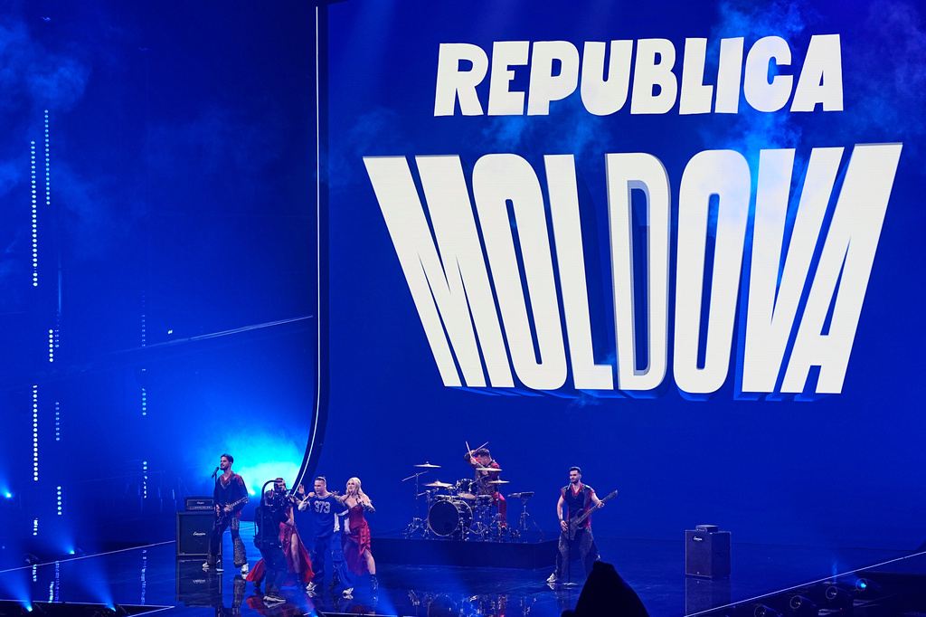 Satoshi from Moldova performs the song "Viva, Moldova!" during the dress rehearsal for the Grand Final of the 70th Eurovision Song Contest in Vienna, Austria, Friday, May 15, 2026. (AP Photo/Martin Meissner)