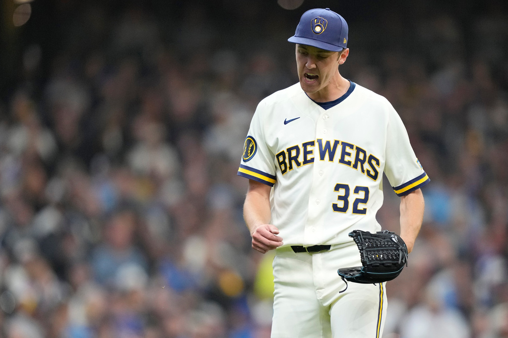 Milwaukee Brewers pitcher Jacob Misiorowski reacts after striking out Chicago White Sox's Andrew Benintendi during the first inning of an opening-day baseball game, Thursday, March 26, 2026, in Milwaukee. (AP Photo/Kayla Wolf)