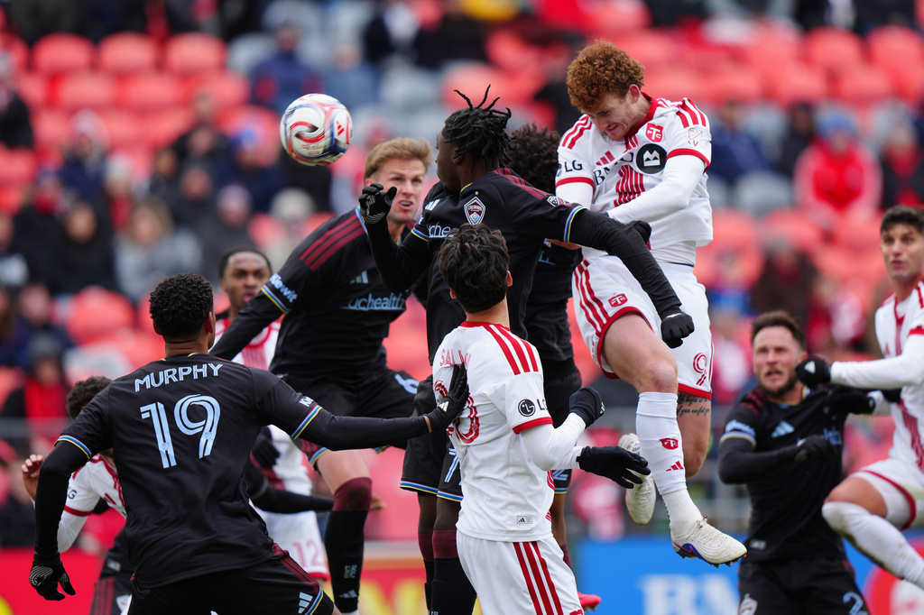 Toronto FC forward Josh Sargent (9) heads the ball into the Colorado Rapids' net scoring his team's third goal of the game during the second half of an MLS soccer game in Toronto, Saturday, April 4, 2026. (Frank Gunn/The Canadian Press via AP)