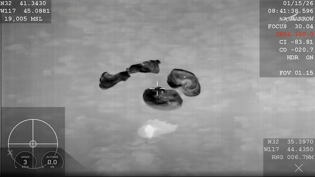 This screengrab from video provided by NASA shows the NASA's SpaceX Crew-11 members re entering the earth in a middle-of-the-night splashdown near San Diego, Calif., Thursday, Jan. 15, 2026. (NASA via AP)