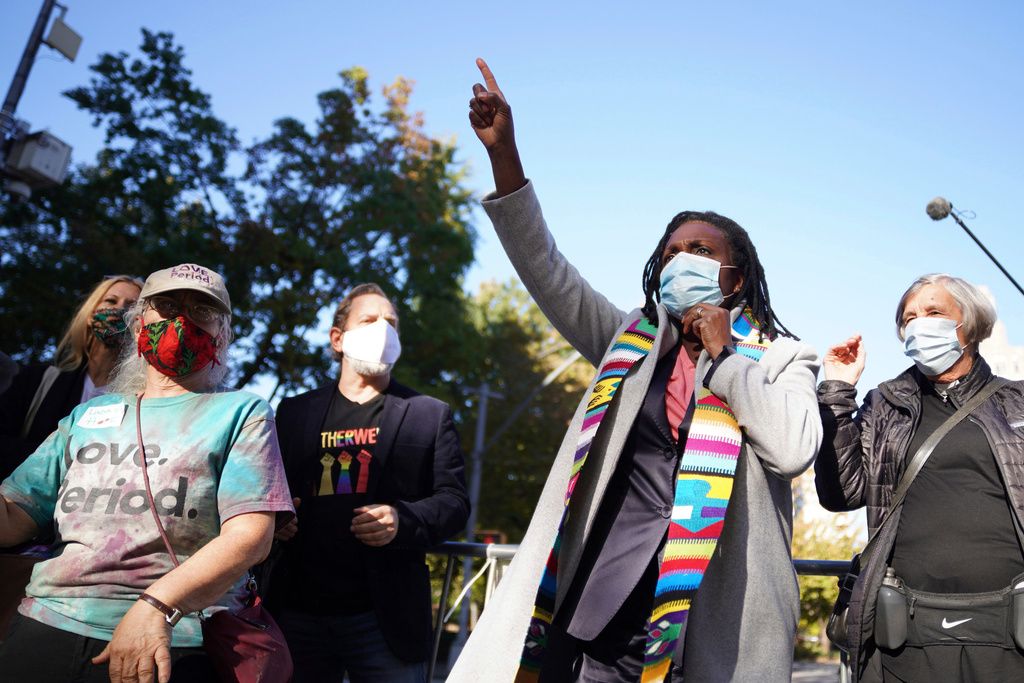 FILE - The Rev. Jacqui Lewis, senior pastor at Middle Collegiate Church, speaks during an interfaith gathering outside of the Judson Memorial Church near Washington Square Park in New York, Nov. 4, 2020. (AP Photo/Emily Leshner, File)