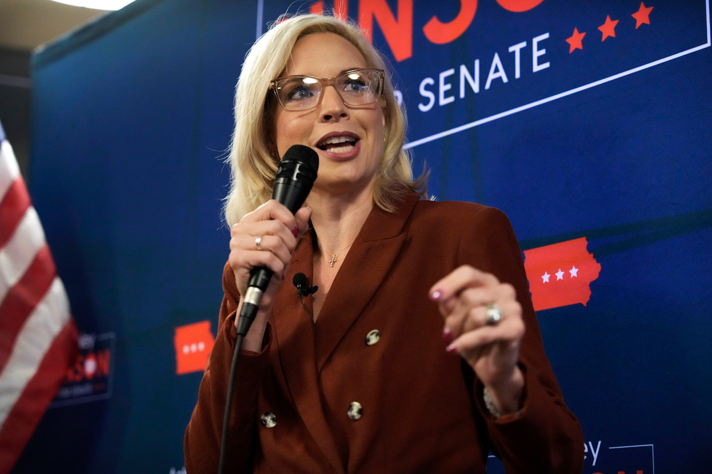 Republican nominee for U.S. Senate Rep. Ashley Hinson, R-Iowa, speaks to supporters, Thursday, Oct. 15, 2026, in Ankeny, Iowa. (AP Photo/Charlie Neibergall)