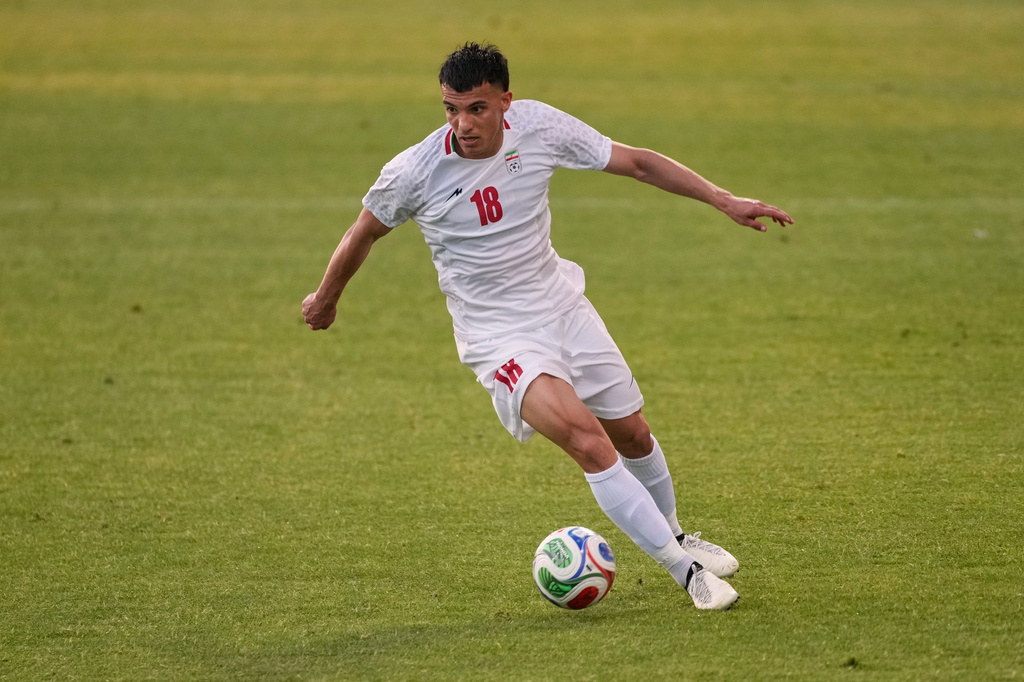 Iran's Amirhossein Hosseinzadeh plays the ball during a friendly soccer match between Iran and Gambia, in Antalya, southern Turkey, Friday, May 29, 2026. (AP Photo/Khalil Hamra)