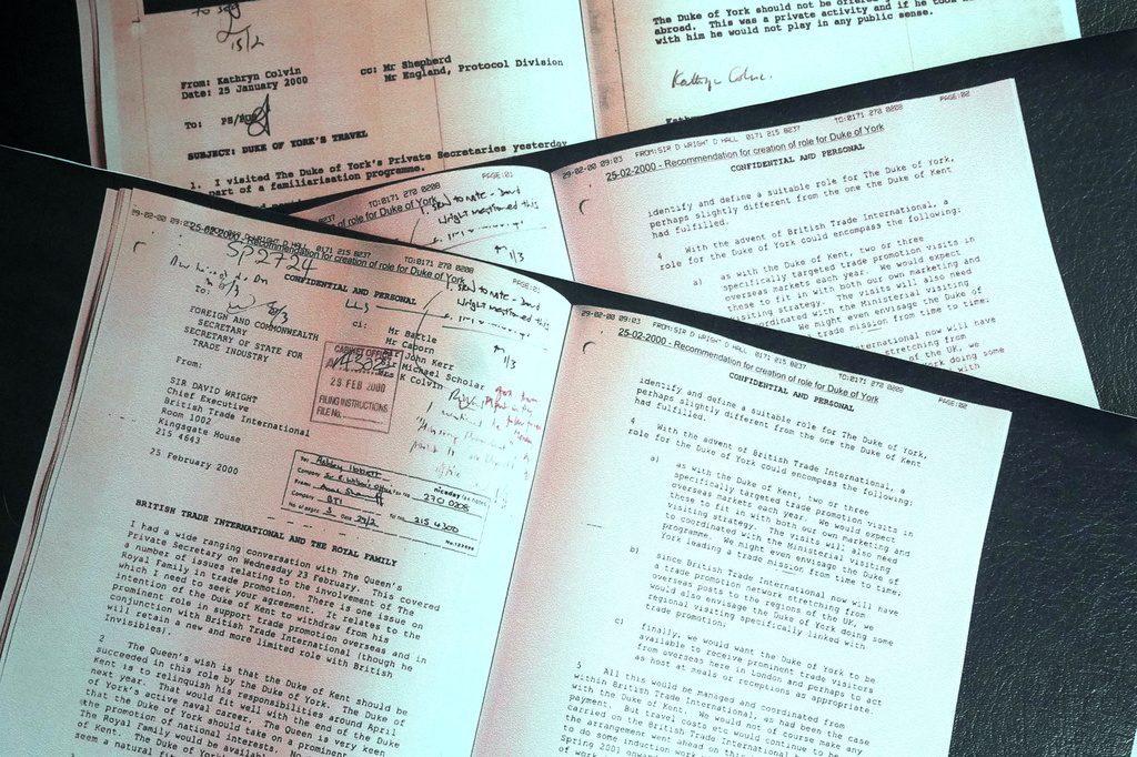 Print out copies of documents released by the British government are photographed in London, Thursday, May 21, 2026 revealing that Queen Elizabeth II was eager for Prince Andrew to become the U.K. trade envoy. (AP Photo/Frank Augstein)