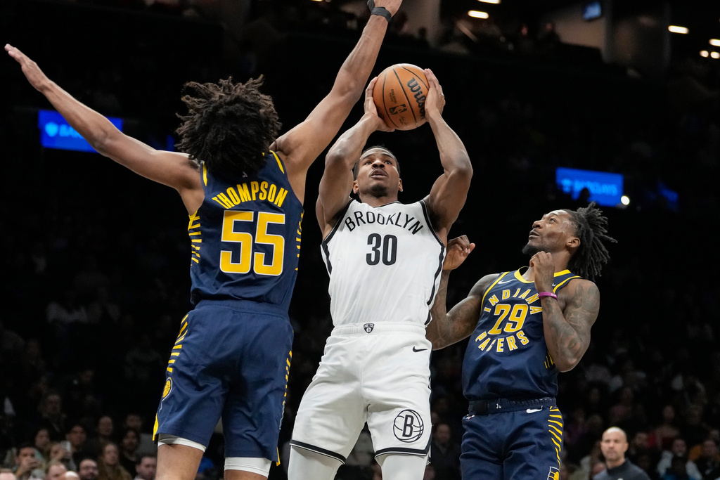 Brooklyn Nets guard Ochai Agbaji shoots during the second half of an NBA basketball game against the Indiana Pacers, Wednesday, Feb. 11, 2026, in New York. (AP Photo/Yuki Iwamura)