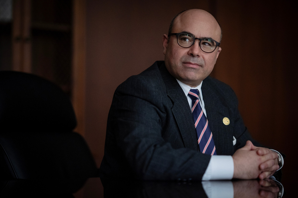 U.S. Attorney Andrew Boutros sits with his hands folded at the Dirksen U.S. Courthouse, Friday, April 3, 2026, in Chicago. (E. Jason Wambsgans/Chicago Tribune via AP)