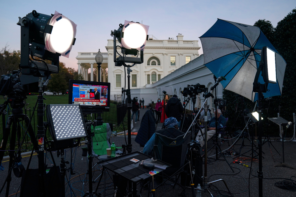 FILE - A feed from the MSNBC cable news channel is pictured on a monitor as media organizations set up outside the White House, Nov. 6, 2020, in Washington. (AP Photo/Evan Vucci, File)