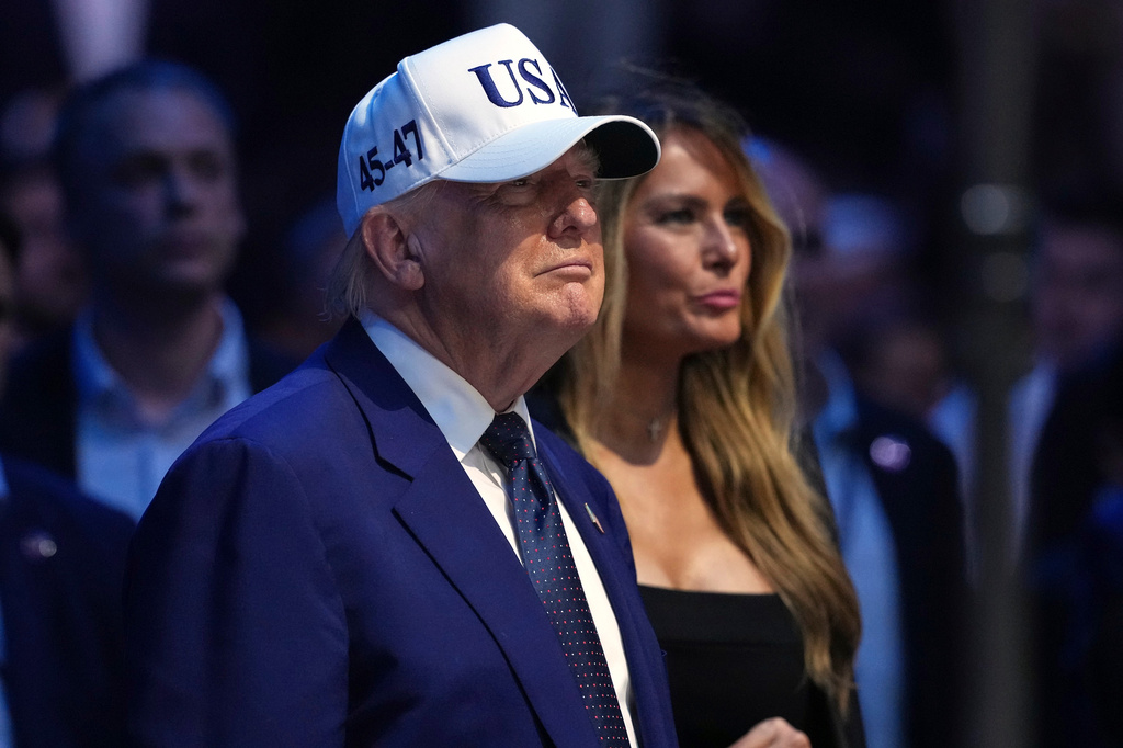 President Donald Trump, left, and first lady Melania Trump watch at the conclusion of UFC Freedom 250 on the South Lawn of the White House, Monday, June 15, 2026, in Washington. (AP Photo/Mark Schiefelbein)