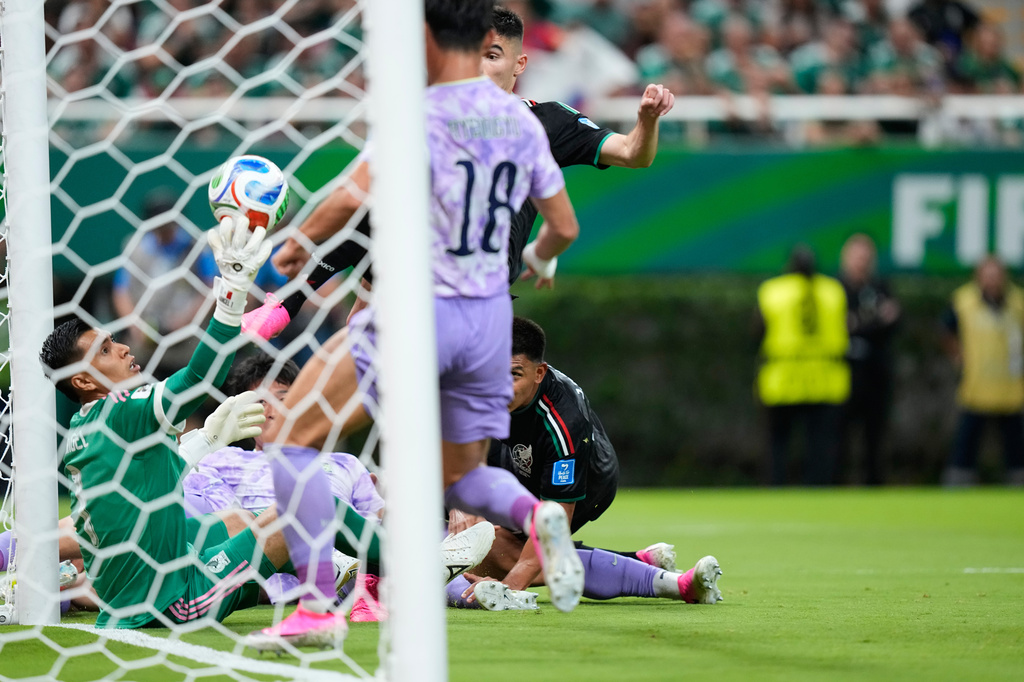 Mexico goalkeeper Raul Rangel (1) makes a save on the goal line during the World Cup Group A soccer match between Mexico and South Korea in Zapopan, near Guadalajara, Mexico, Thursday, June 18, 2026. (AP Photo/Fernando Llano)