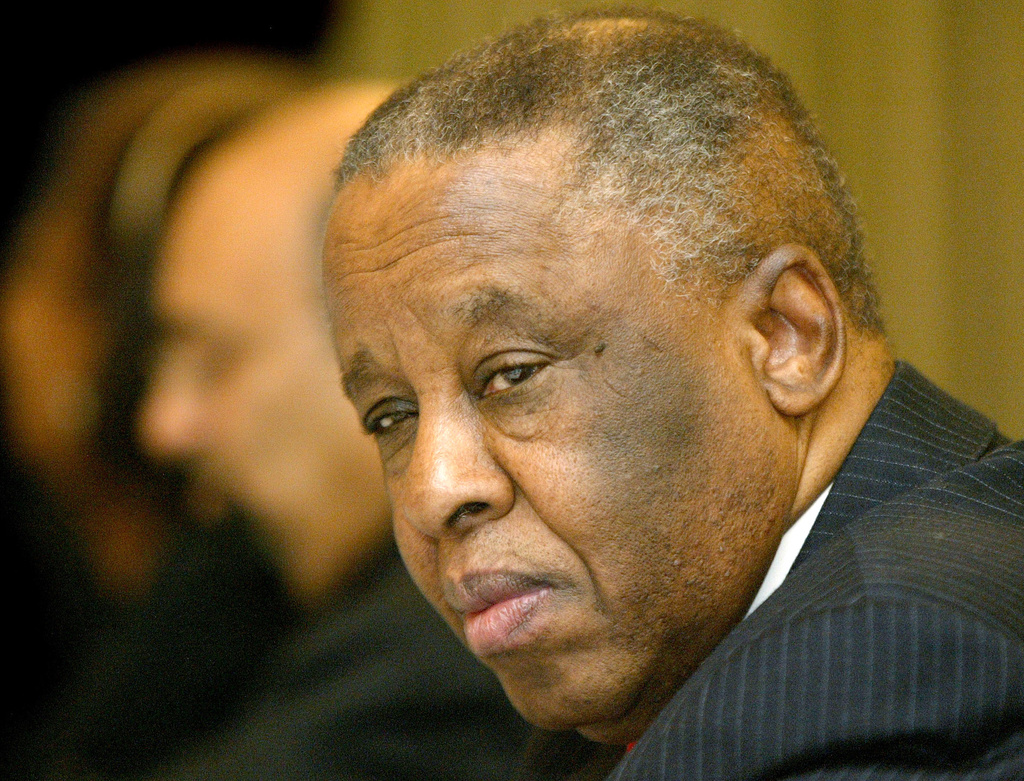 FILE - President of the Republic of Botswana Festus Mogae looks on at an interactive meeting of a high level delegation from Botswana and members of the Indian Merchants' Chamber, one of India's leading trade bodies, in Mumbai, India, Dec. 12, 2006. (AP Photo/Gautam Singh, File)