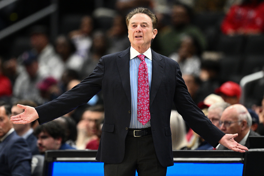 St. John's head coach Rick Pitino gestures during the first half of an NCAA college basketball game against Georgetown, Wednesday, Dec. 31, 2025, in Washington. (AP Photo/Nick Wass)