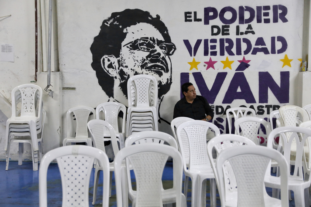 A supporter of presidential candidate Ivan Cepeda of the ruling Historic Pact coalition sits at his campaign headquarters after election results showed him trailing in the runoff election in Cali, Colombia, Sunday, June 21, 2026. (AP Photo/Santiago Saldarriaga)