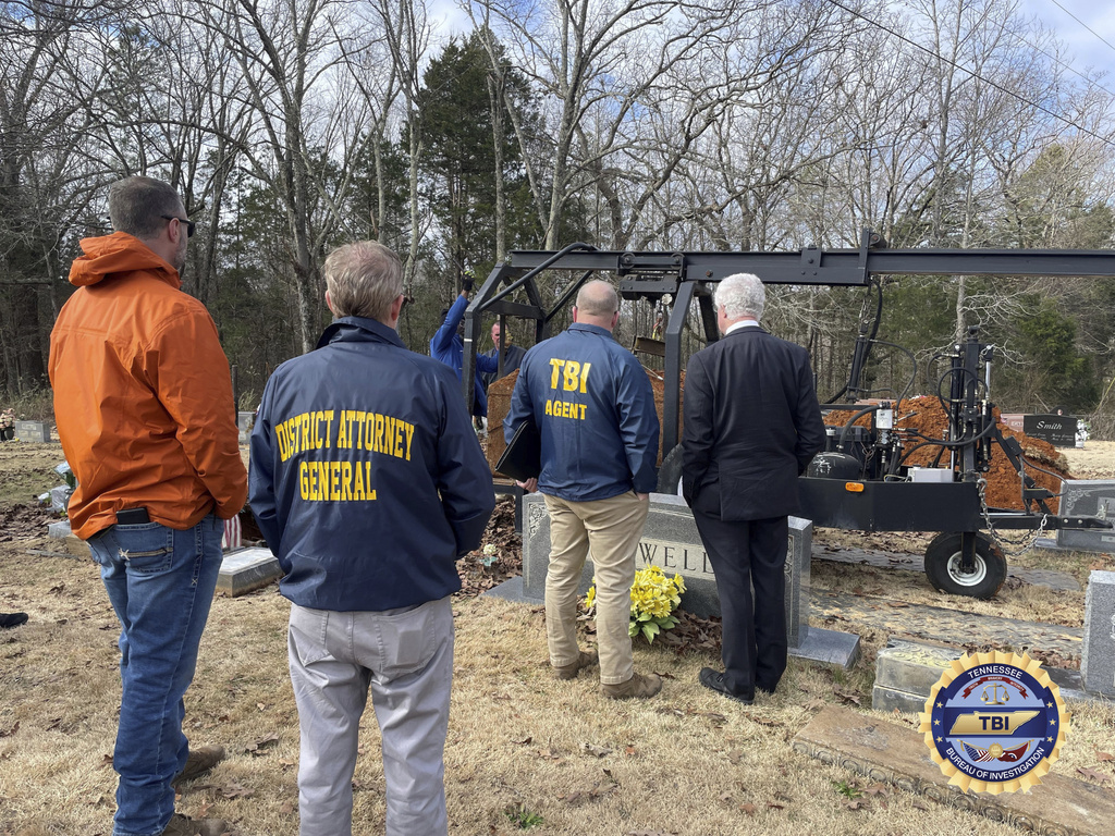 In this undated photo provided by the Tennessee Bureau of Investigation on Friday, Aug. 29, 2025, Pauline Mullins Pusser's body is exhumed from her grave in Adamsville Cemetery, in Adamsville, Tenn., in 2024. (TBI via AP)