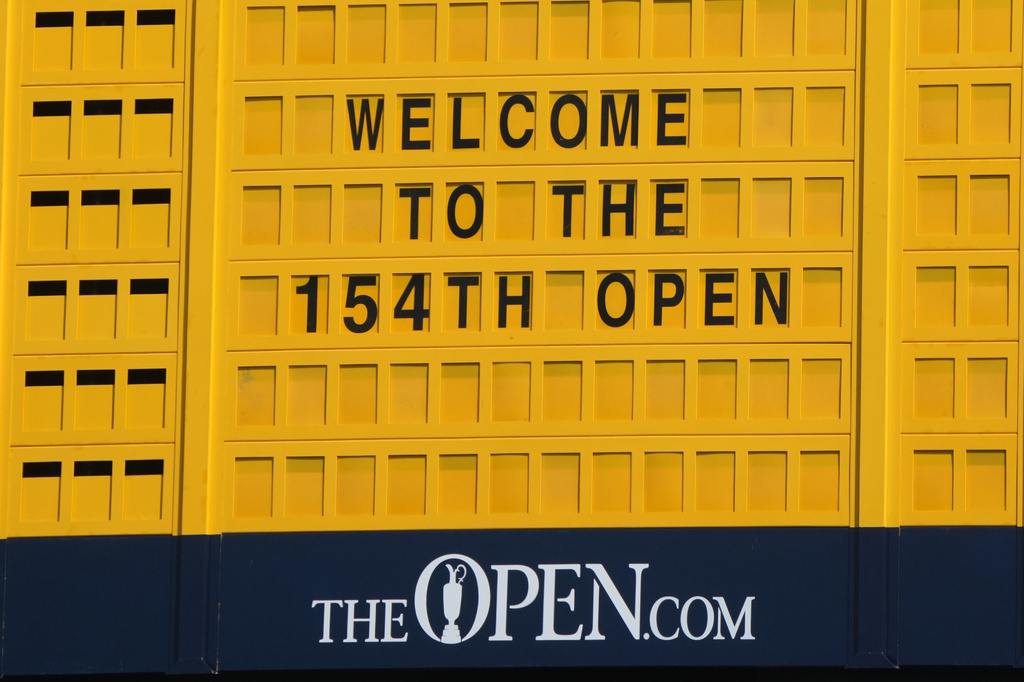 The welcome to the Open sign on the large scoreboard overlooking the 18th green ahead of the British Open Golf championships at Royal Birkdale golf club, in Southport, England, Wednesday, July 15, 2026. (AP Photo/Jon Super)