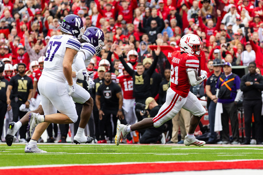 Nebraska running back Emmett Johnson (21) runs in for a touchdown against Northwestern during the first half of an NCAA college football game, Saturday, Oct. 25, 2025, in Lincoln, Neb. (AP Photo/Bonnie Ryan) Nebraska running back Emmett Johnson (21) runs in for a touchdown against Northwestern during the first half of an NCAA college football game, Saturday, Oct. 25, 2025, in Lincoln, Neb. (AP Photo/Bonnie Ryan)