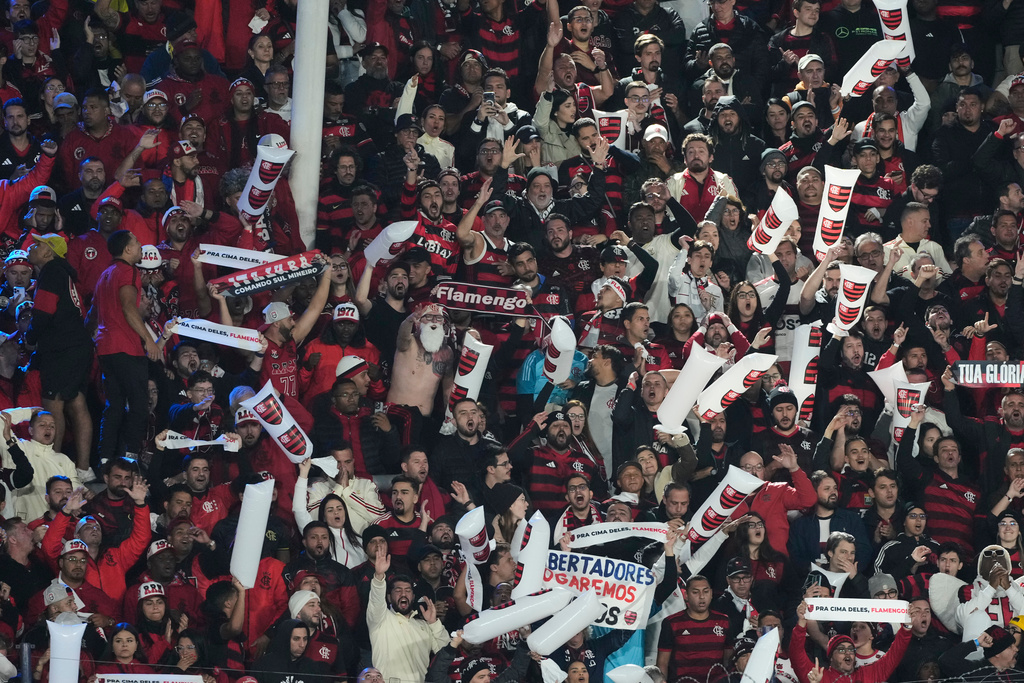 Fans of Brazil's Flamengo attend a Copa Libertadores semifinal second leg soccer match against Argentina's Racing Club in Buenos Aires, Argentina, Wednesday, Oct. 29, 2025. (AP Photo/Gustavo Garello)