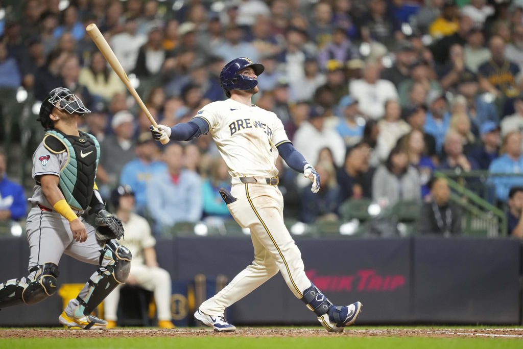 Milwaukee Brewers' Brice Turang (2) hits a two-run home run during the sixth inning of a baseball game against the Arizona Diamondbacks Tuesday, Aug. 26, 2025, in Milwaukee. (AP Photo/Kayla Wolf)