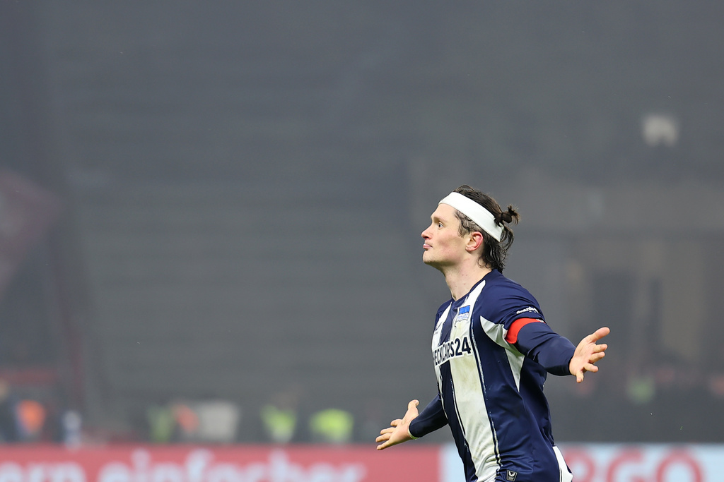 Hertha Berlins' Fabian Reese celebrates after scoring a goal during the German Cup quarterfinal soccer match between Hertha Berlin and SC Freiburg in Berlin, Tuesday, Feb. 10, 2026. (Andreas Gora/dpa via AP)