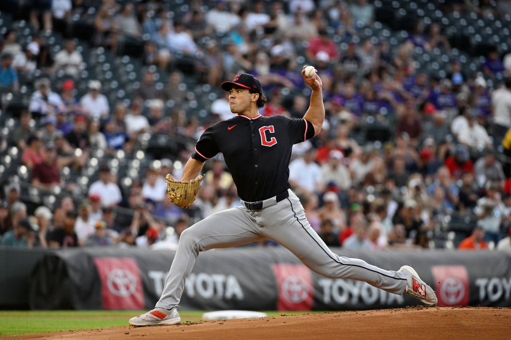 Cleveland Guardians starting pitcher Joey Cantillo throws in the first inning of a baseball game against the Colorado Rockies, Friday, Aug. 21, 2026, in Denver. (AP Photo/Geneva Heffernan)
