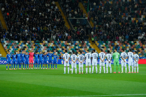 Italy's and Israel's players observe a minute of silence for the three military police officers Carabinieri dead in a explosion near Verona prior to the start of the World Cup 2026 Group I qualifying soccer match between Italy and Israel at the Bluenergy Stadium in Udine, Italy, Tuesday, Oct. 14, 2025. (AP Photo/Luca Bruno) Italy's and Israel's players observe a minute of silence for the three military police officers Carabinieri dead in a explosion near Verona prior to the start of the World Cup 2026 Group I qualifying soccer match between Italy and Israel at the Bluenergy Stadium in Udine, Italy, Tuesday, Oct. 14, 2025. (AP Photo/Luca Bruno)