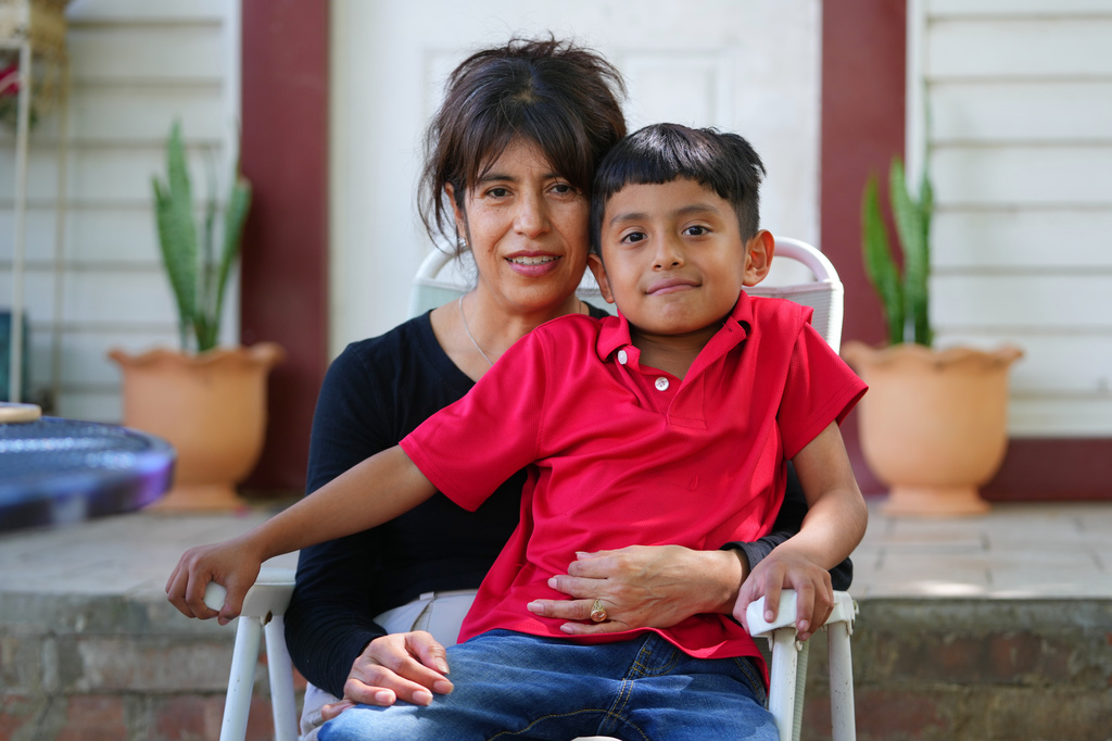 Maria Contreras, left, poses for a photo with her son, Ian Contreras on Thursday, April 9, 2026, in Fort Worth, Texas. (AP Photo/Julio Cortez)